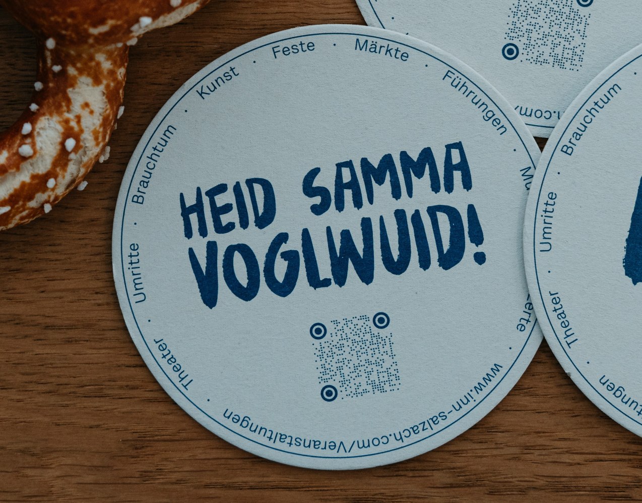 Bierdeckel mit bayerischem Spruch HEID SAMMA VOGLWUID, © Inn-Salzach Tourismus